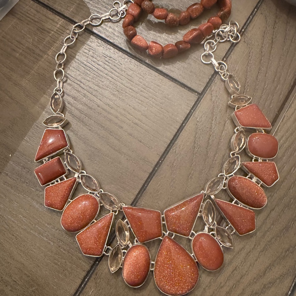 Goldstone and Morgamite stone necklace along with 3 goldstone stretch bracelets.